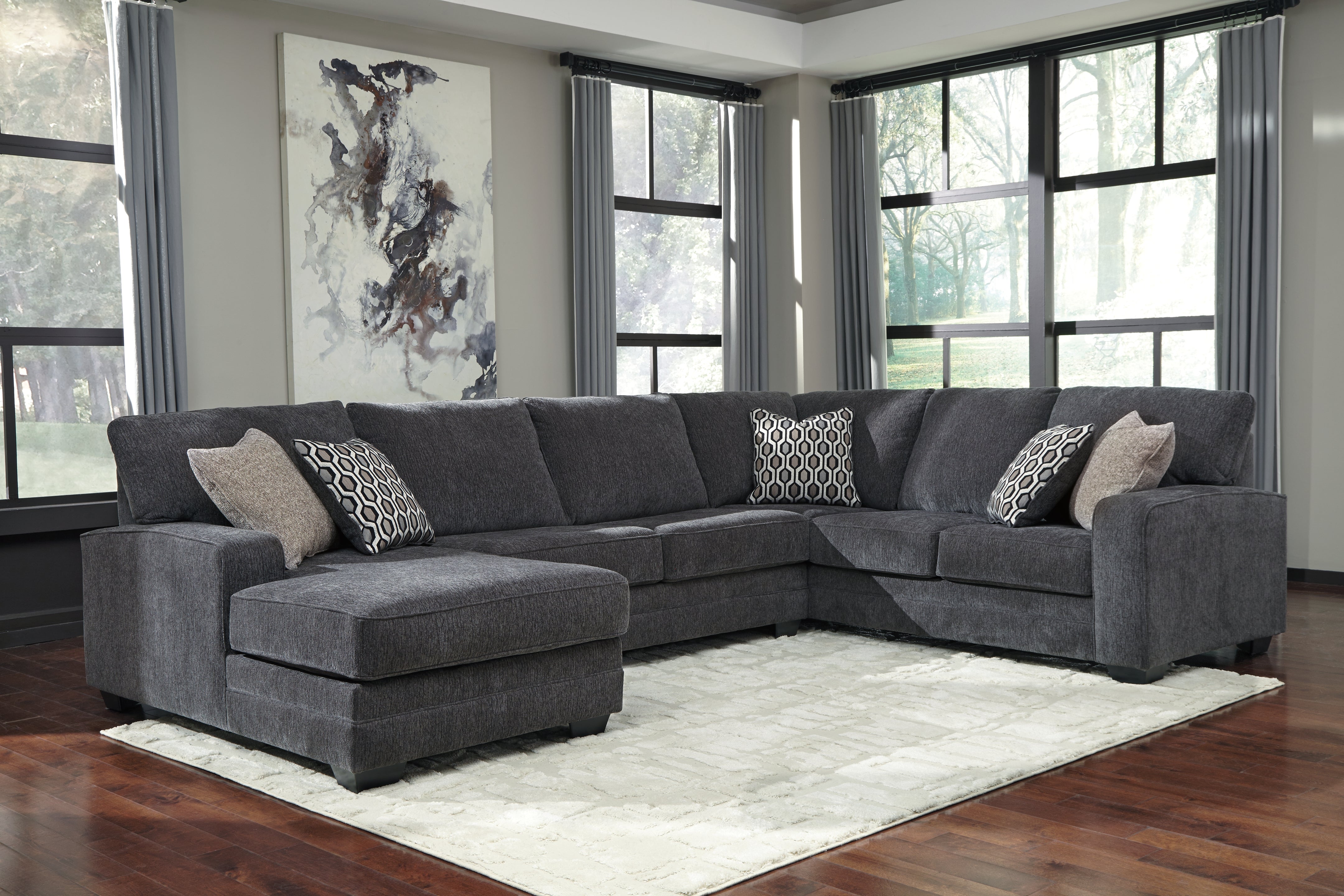 J&M Furniture - Ashley Furniture - Tracling 3-Piece Sectional with Chaise - RAF 3-Piece Sectional with Chaise - 72600S1