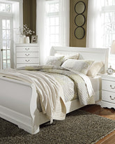 J&M Furniture - Ashley Furniture - Anarasia Queen Sleigh Bed with Chest of Drawers and Nightstand - Queen Sleigh Bed with Chest of Drawers and Nightstand - B129B12