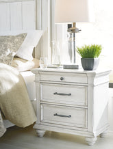 J&M Furniture - Ashley Furniture - Kanwyn Nightstand - Three Drawer Night Stand - B777-93