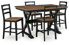 J&M Furniture - Ashley Furniture - Wildenauer Counter Height Extension Dining Table and 4 Barstools - Counter Height Extension Dining Table and 4 Barstools - D634D9