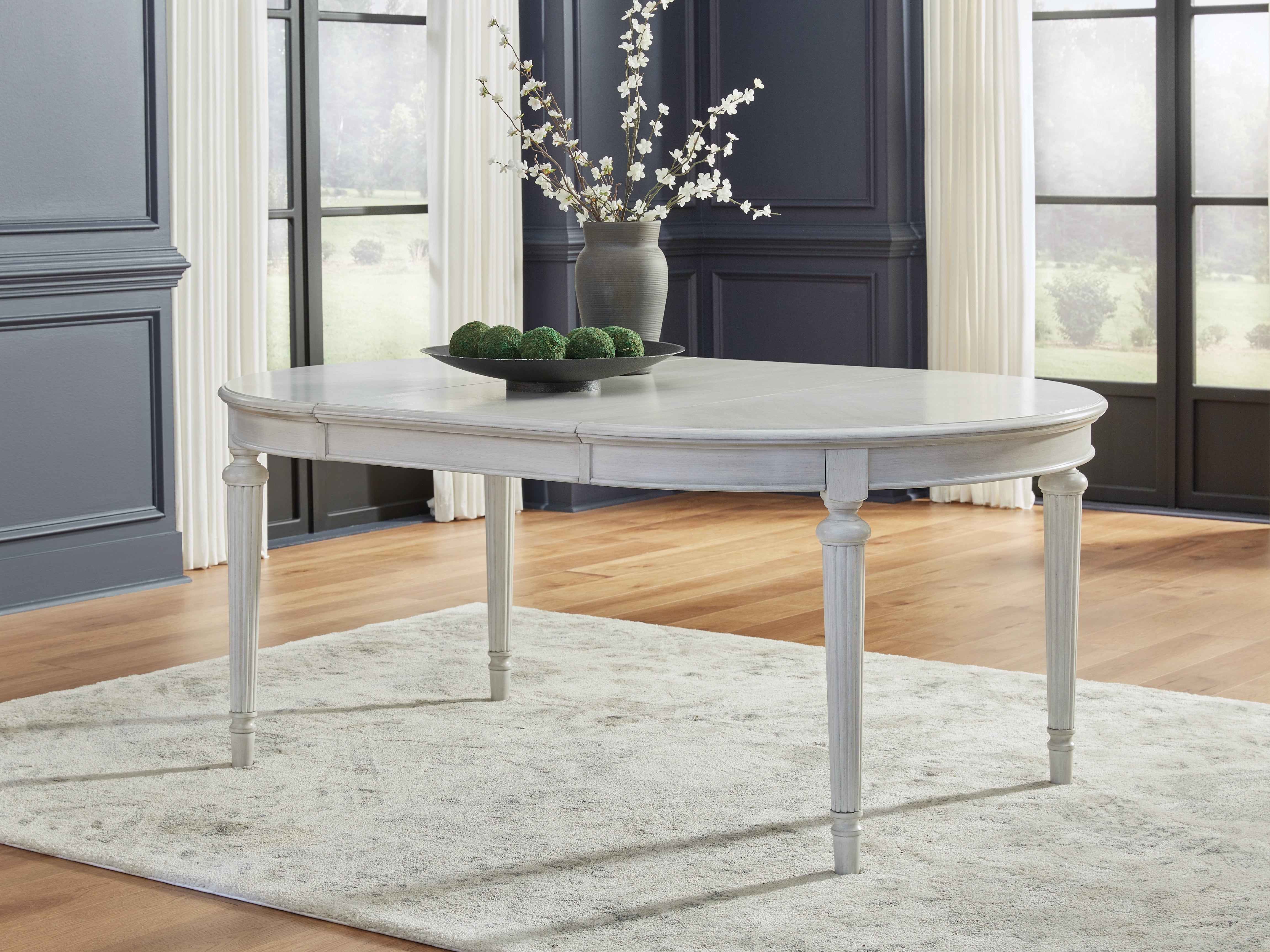 J&M Furniture - Ashley Furniture - Montelaine Dining Extension Table - Oval Dining Room EXT Table - D795-35