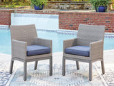 J&M Furniture - Ashley Furniture - Half Moon Beach Outdoor Arm Chair with Cushion (Set of 2) - Arm Chair With Cushion (Set of 2) - PCP418-601A