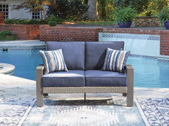 J&M Furniture - Ashley Furniture - Half Moon Beach Outdoor Loveseat with Cushion - Loveseat w/Cushion - PCP418-835