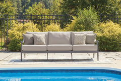 J&M Furniture - Ashley Furniture - Ocean Beach Outdoor Sofa with Cushion - Sofa with Cushion - PCP510-838