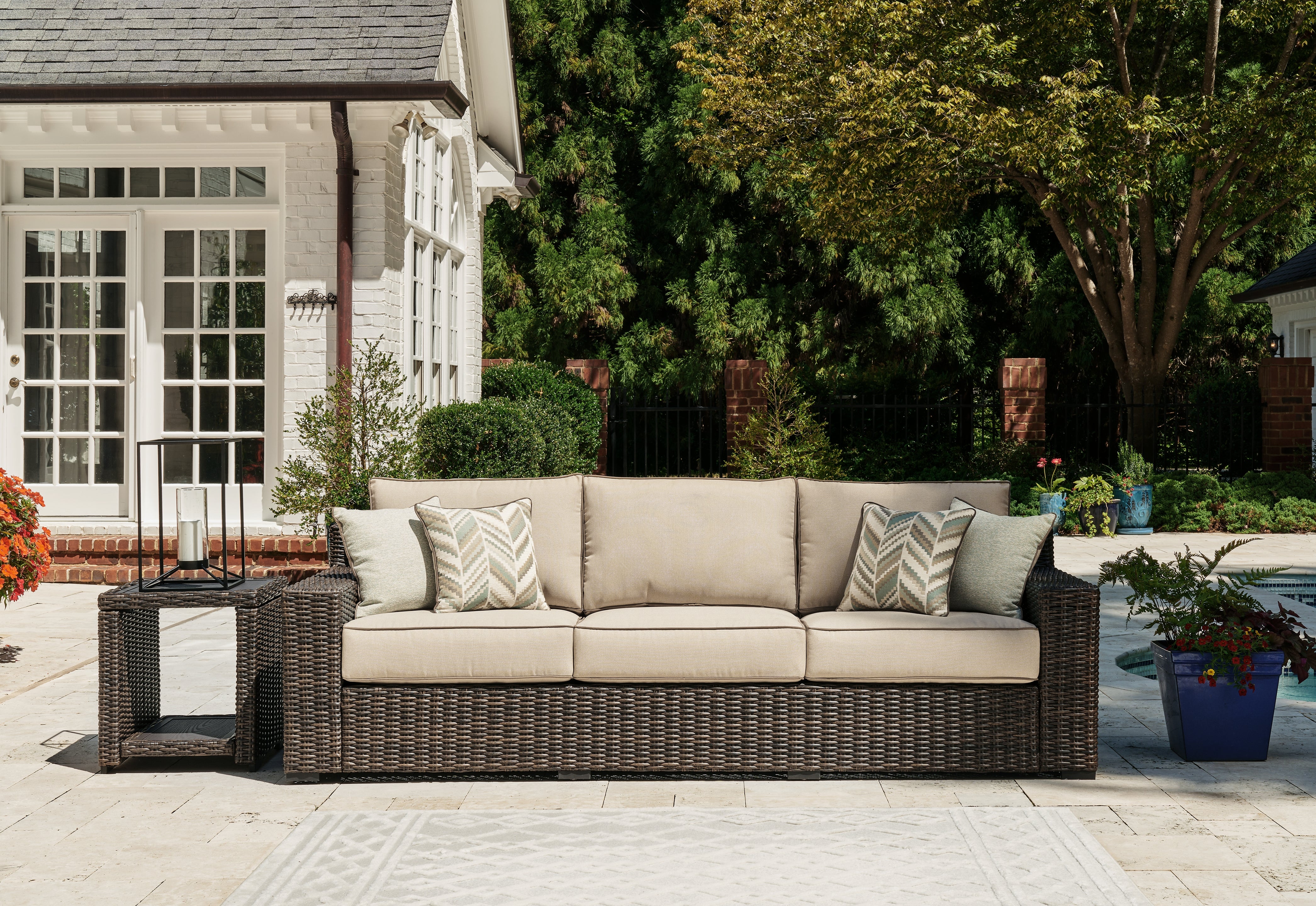 J&M Furniture - Ashley Furniture - Coastline Bay Outdoor Sofa with Cushion - Sofa with Cushion - P784-838