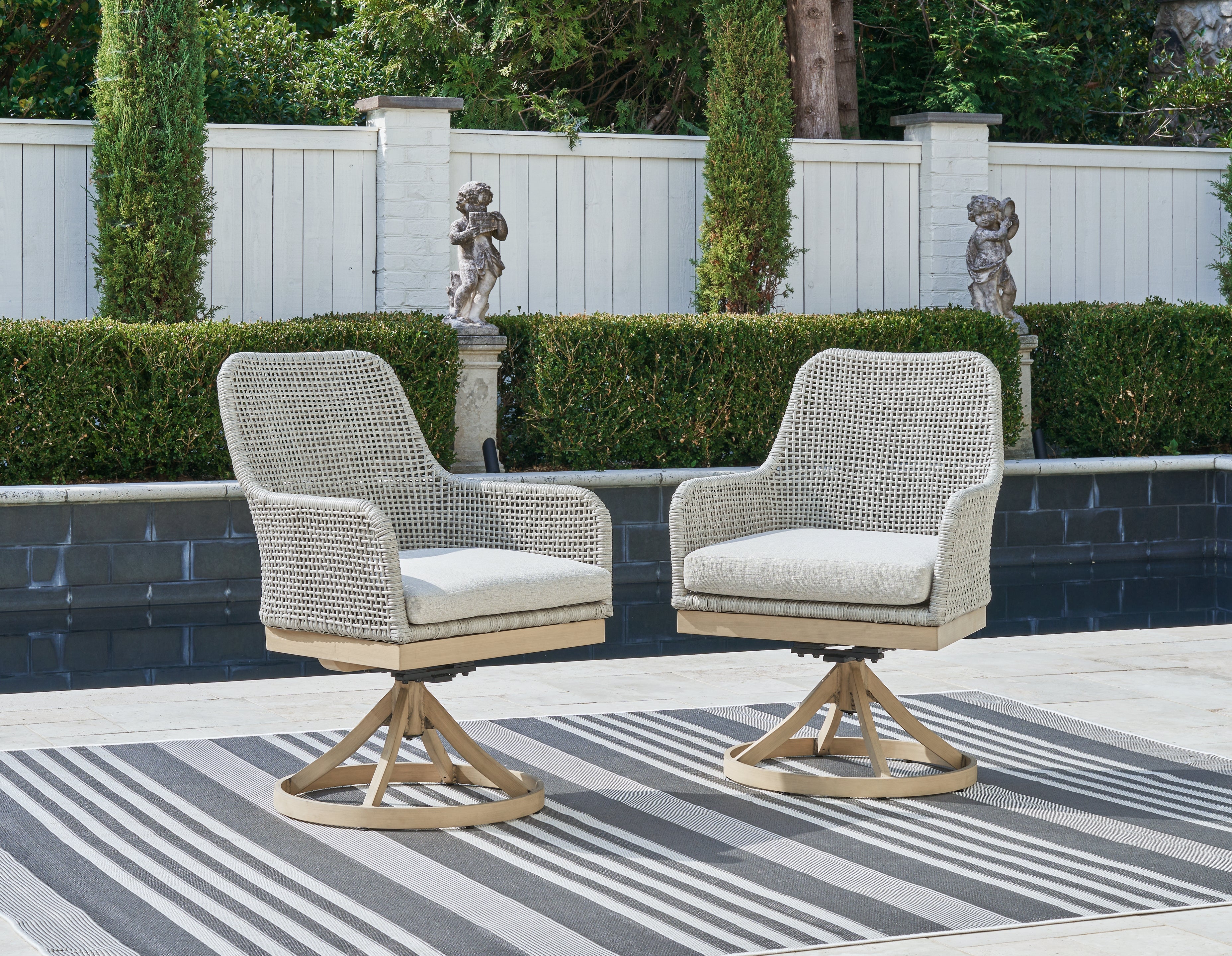 J&M Furniture - Ashley Furniture - Seton Creek Outdoor Swivel Dining Chair (Set of 2) - Swivel Chair w/Cushion (Set of 2) - P798-602A