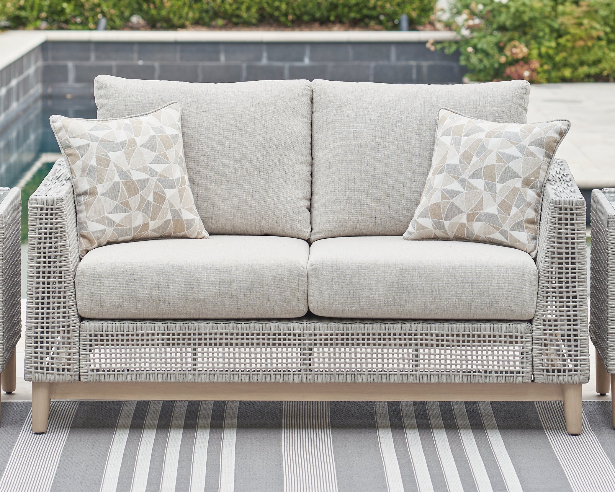 J&M Furniture - Ashley Furniture - Seton Creek Outdoor Loveseat with Cushion - Loveseat w/Cushion - P798-835