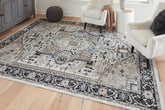 J&M Furniture - Ashley Furniture - Gregmoore 7'9" x 9'11" Washable Rug - 7'9" x 9'11" Washable Rug - R405821