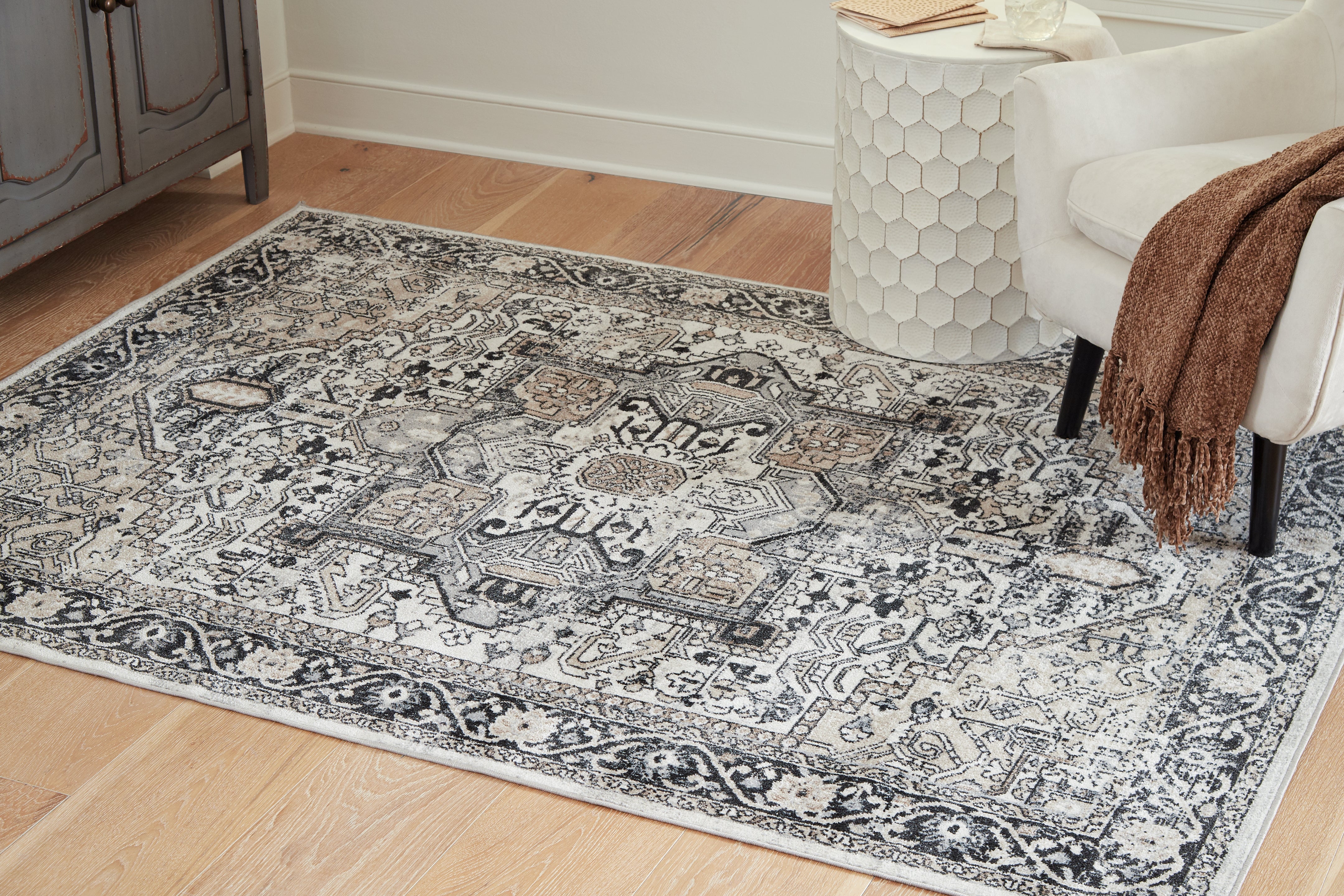 J&M Furniture - Ashley Furniture - Gregmoore 5'2" x 6'10" Washable Rug - 5'2" x 6'10" Washable Rug - R405822