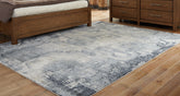 J&M Furniture - Ashley Furniture - Langrich 7'10" x 10'6" Rug - 7'10" x 10'6" Rug - R406131