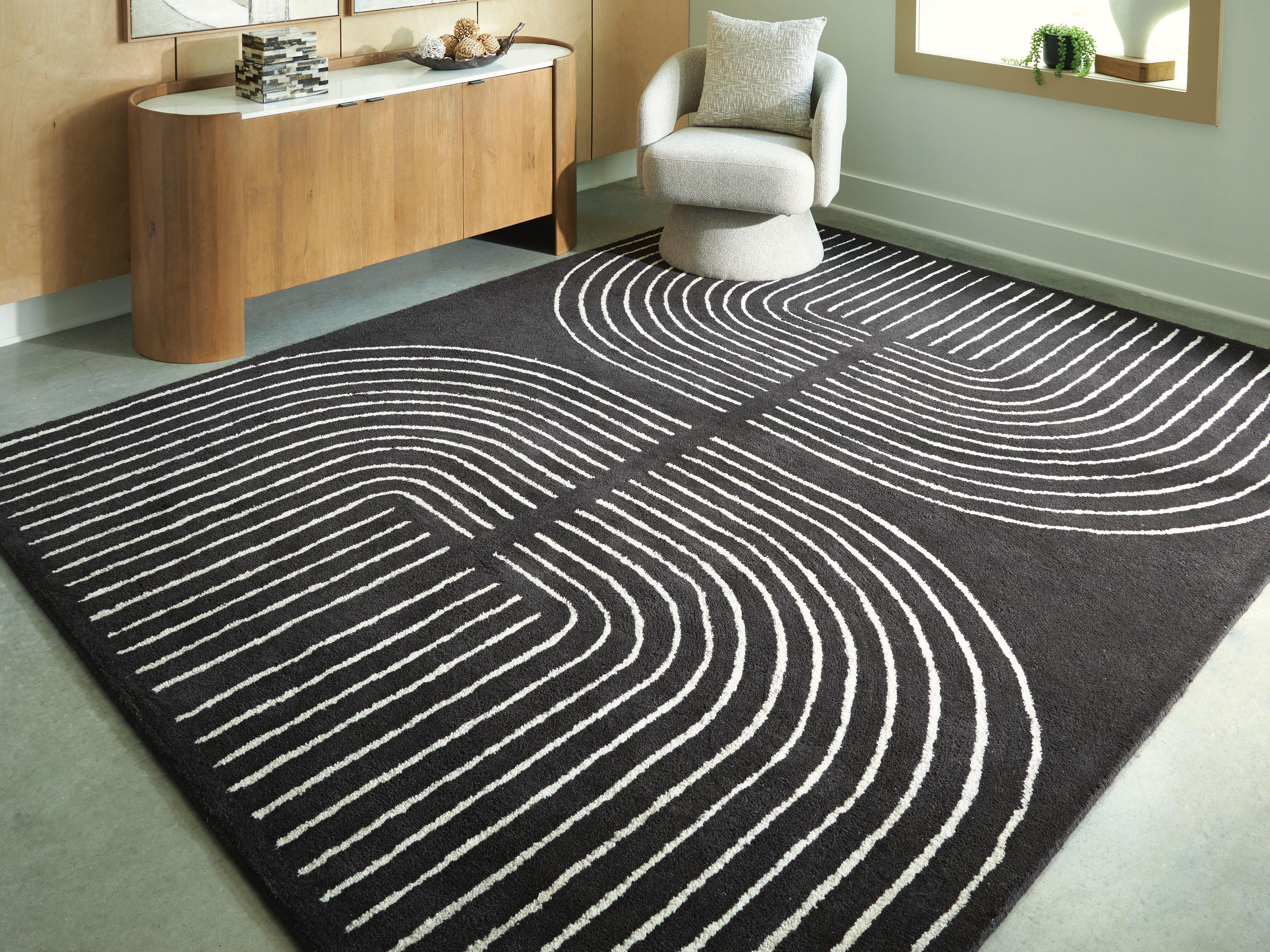J&M Furniture - Ashley Furniture - Eldonmore 7'8" x 10' Area Rug - 7'8" x 10' Area Rug - R407571