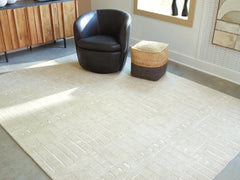 J&M Furniture - Ashley Furniture - Wolbert 7'8" x 10' Area Rug - 7'8" x 10' Area Rug - R407661