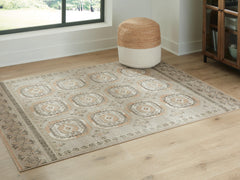 J&M Furniture - Ashley Furniture - Bachby 5'3" x 7' Area Rug - 5'3" x 7' Area Rug - R407682