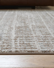 Fuadwick 7'10" x 10' Area Rug