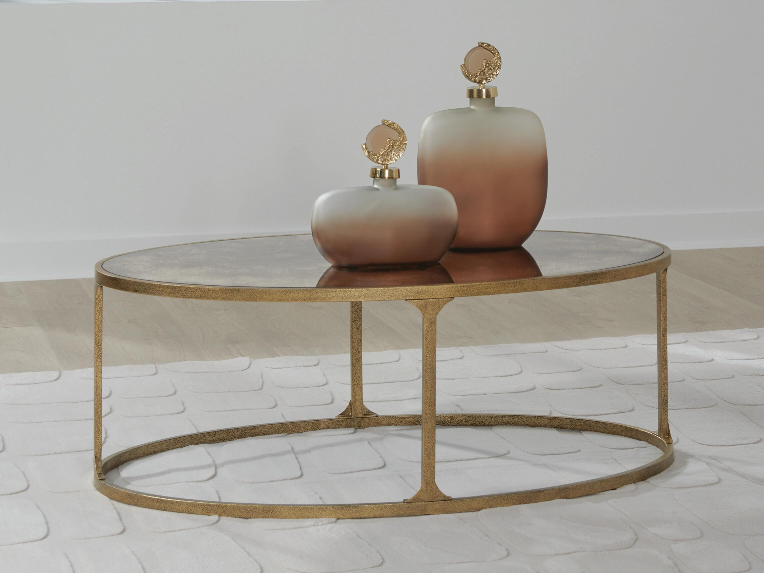 J&M Furniture - Ashley Furniture - Korajane Coffee Table - Oval Cocktail Table - T399-0