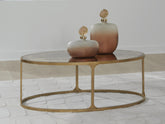 J&M Furniture - Ashley Furniture - Korajane Coffee Table - Oval Cocktail Table - T399-0