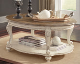 J&M Furniture - Ashley Furniture - Realyn Coffee Table - Oval Cocktail Table - T743-0