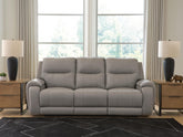 J&M Furniture - Ashley Furniture - Real Moments Power Reclining Sofa with Audio Seating - PWR REC Sofa w/Audio Seating - PCU1370015A