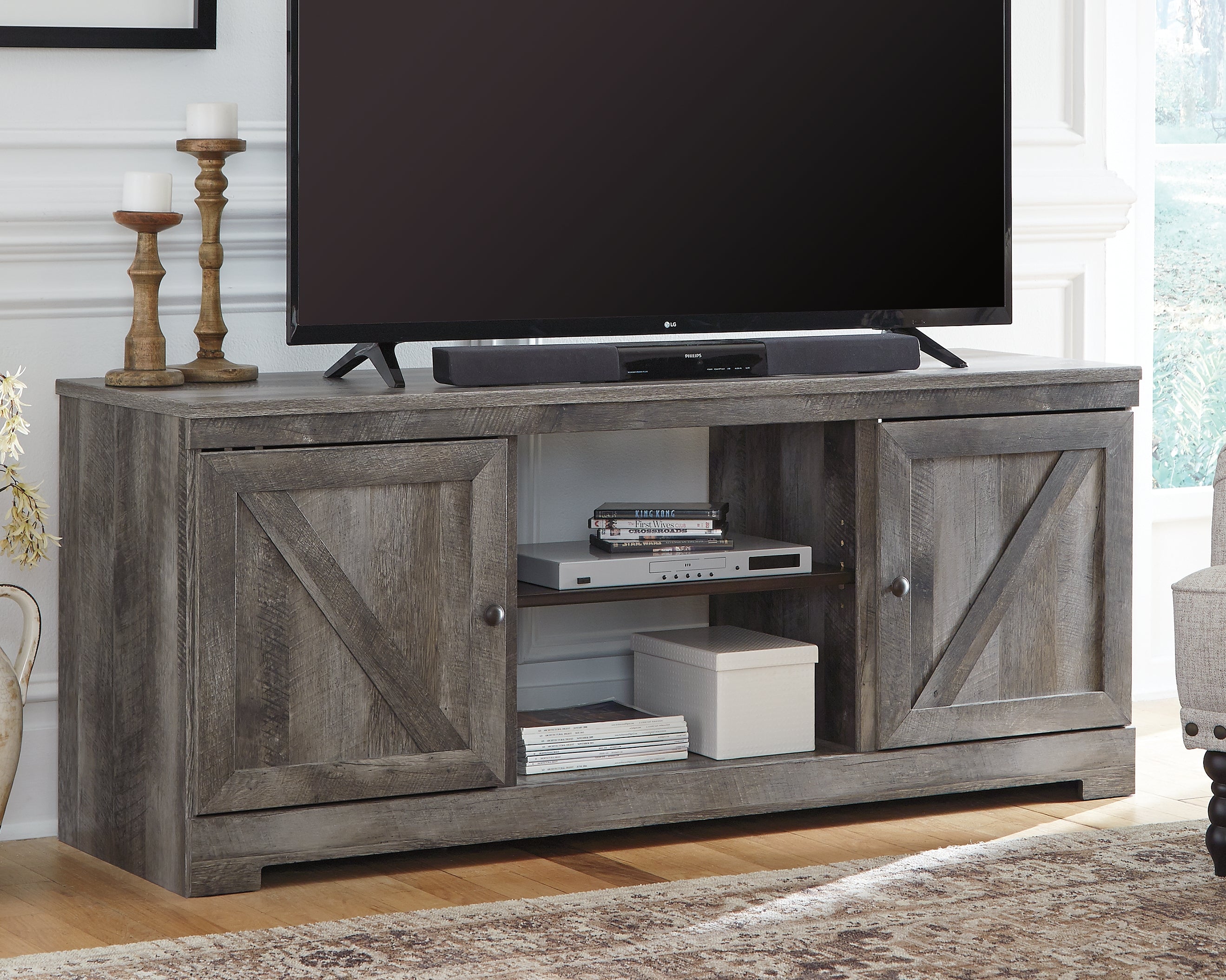 J&M Furniture - Ashley Furniture - Wynnlow 63" TV Stand - 63" - W440-68
