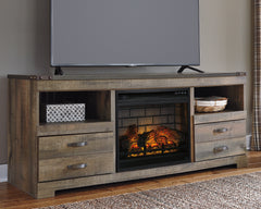 J&M Furniture - Ashley Furniture - Trinell 63" TV Stand with Electric Fireplace - 63" TV Stand with Electric Fireplace - W446W9