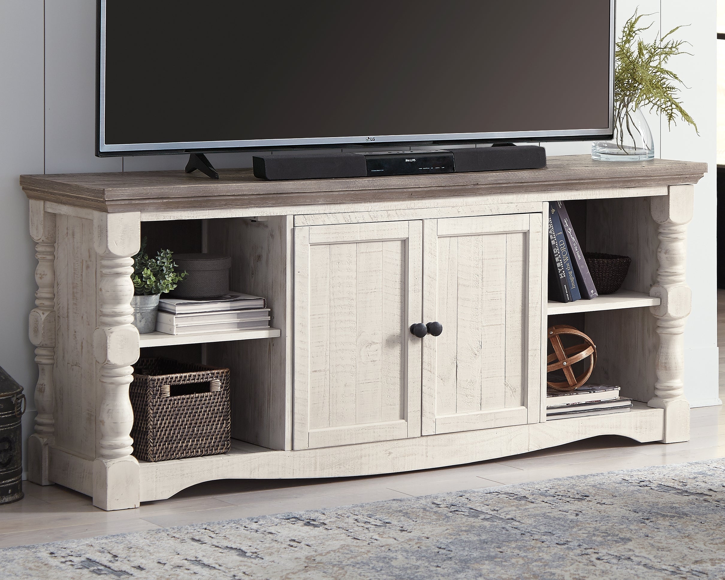 J&M Furniture - Ashley Furniture - Havalance 67" TV Stand - 67" - W814-30