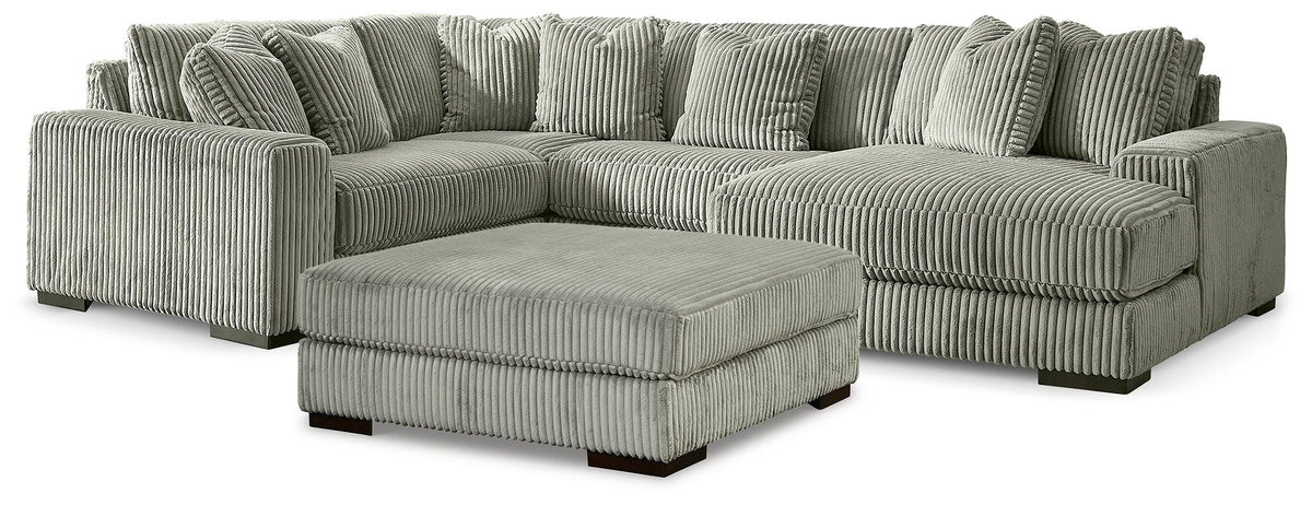 J&M Furniture - Ashley Furniture - Lindyn 4-Piece Sectional with Chaise and Oversized Accent Ottoman - 4-Piece Sectional with Chaise and Oversized Accent Ottoman - 21105U12