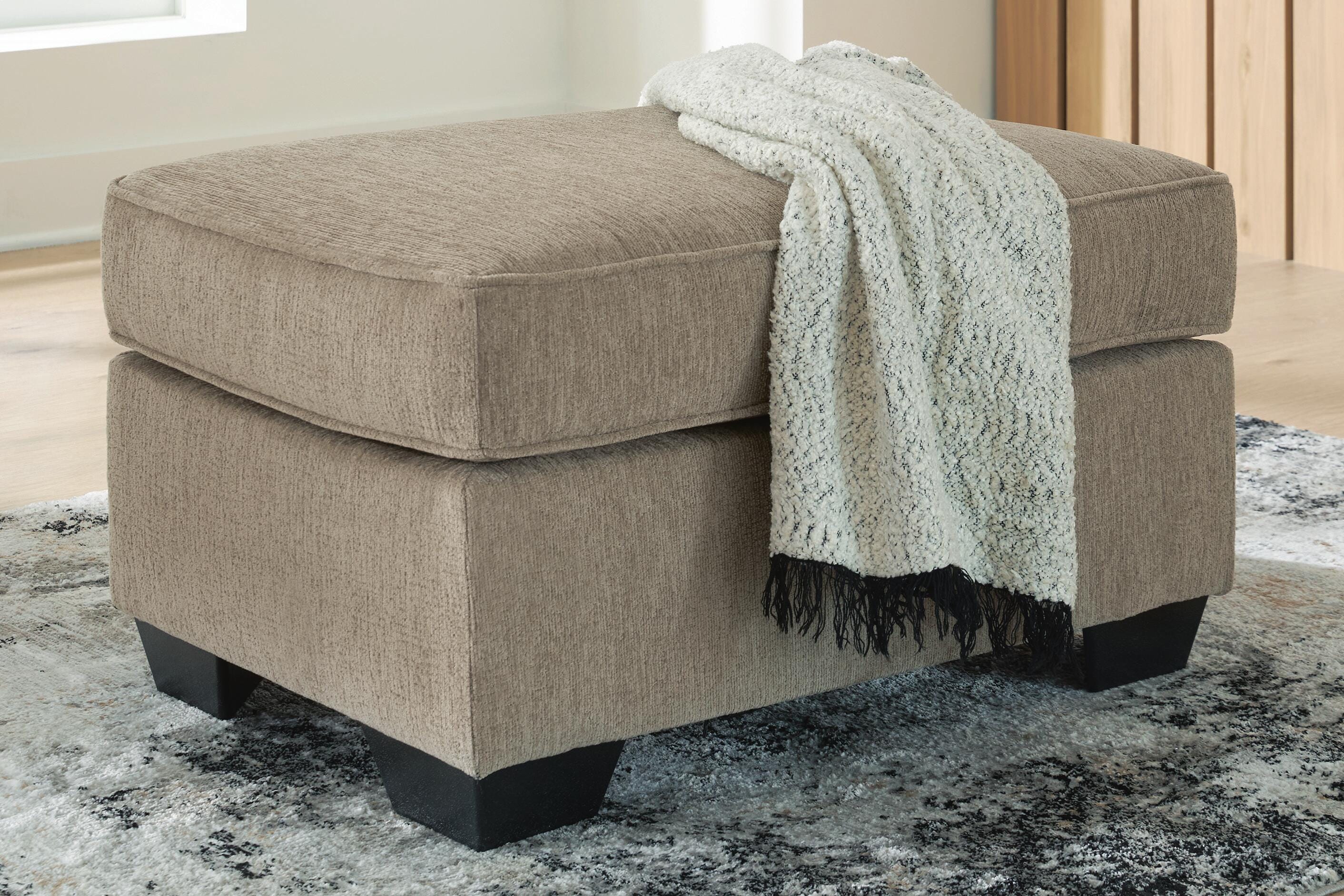 J&M Furniture - Ashley Furniture - Olten Ottoman - Ottoman / Mocha - 3130414