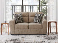 J&M Furniture - Ashley Furniture - Olten Loveseat - Loveseat / Mocha - 3130435