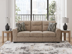 J&M Furniture - Ashley Furniture - Olten Sofa - Sofa / Mocha - 3130438