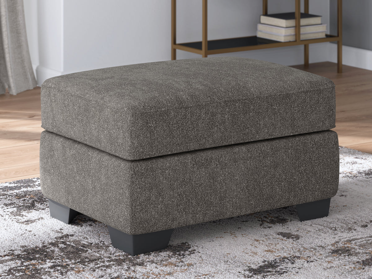 J&M Furniture - Ashley Furniture - Olten Ottoman - Ottoman / Mocha - 3130414