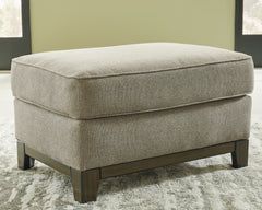 J&M Furniture - Ashley Furniture - Kaywood Ottoman - Ottoman / Granite - 5630314