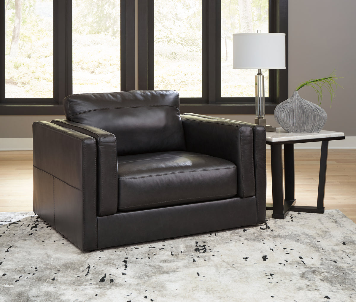 J&M Furniture - Ashley Furniture - Amiata Oversized Chair - Chair and a Half / Onyx - 5740523