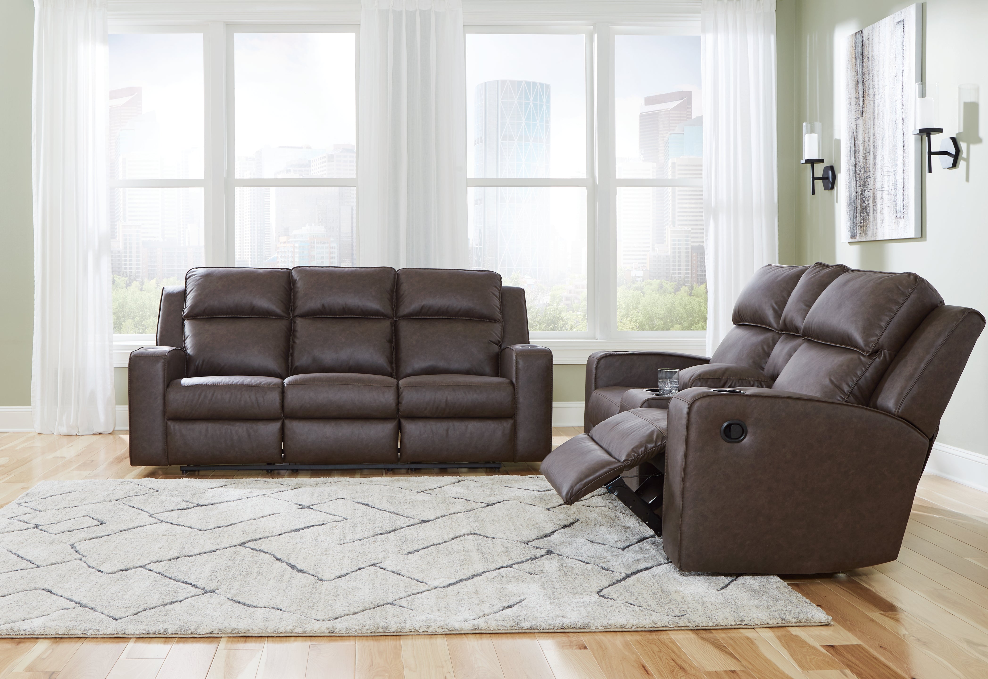 J&M Furniture - Ashley Furniture - Lavenhorne Reclining Sofa and Loveseat - Reclining Sofa and Loveseat / Umber - 63306U1
