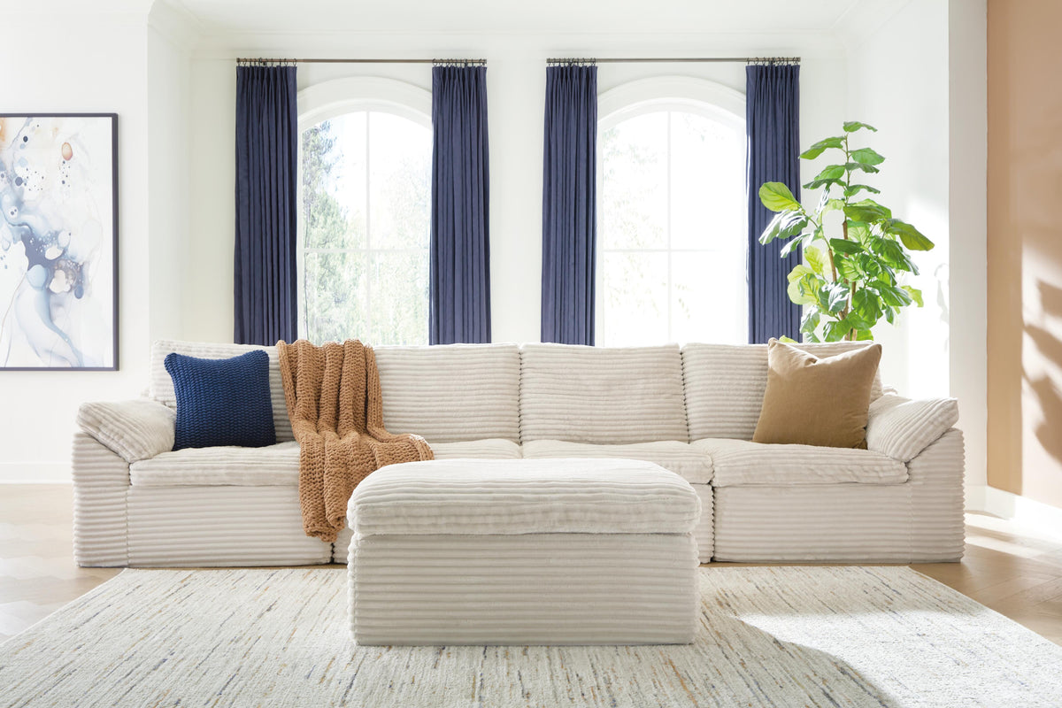 J&M Furniture - Ashley Furniture - Fannin 4-Piece Sectional with Ottoman - RAF 4-Piece Sectional with Ottoman - PC84304S1