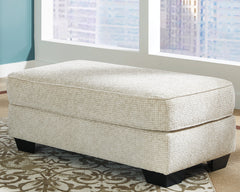 J&M Furniture - Ashley Furniture - Monaghan Ottoman - Ottoman / Sandstone - 9620514