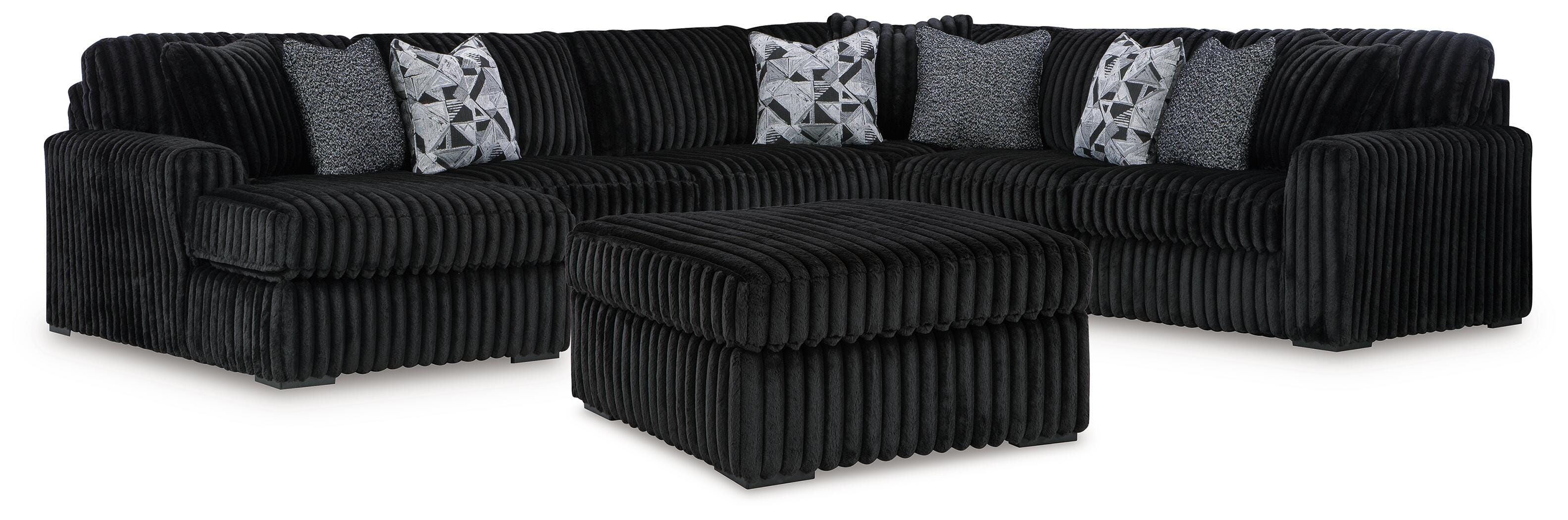 J&M Furniture - Ashley Furniture - Midnight-Madness 4-Piece Sectional and Ottoman - 4-Piece Sectional and Ottoman - 98103U6