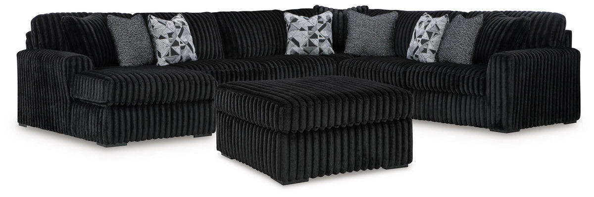 J&M Furniture - Ashley Furniture - Midnight-Madness 4-Piece Sectional and Ottoman - 4-Piece Sectional and Ottoman - 98103U6