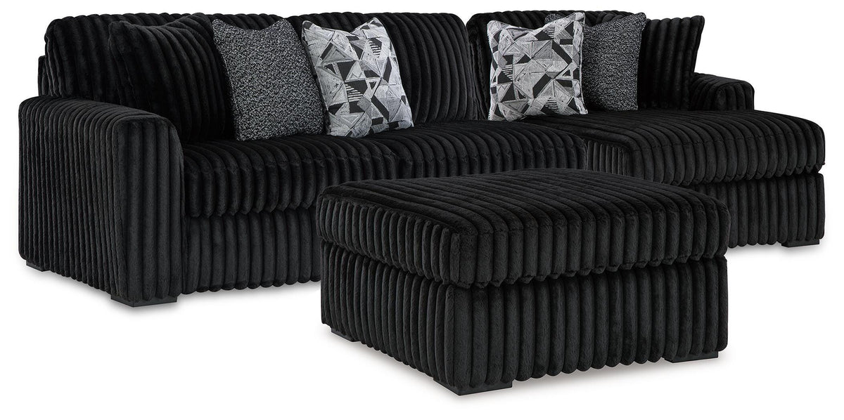 J&M Furniture - Ashley Furniture - Midnight-Madness 2-Piece Sectional and Oversized Accent Ottoman - 2-Piece Sectional and Oversized Accent Ottoman - 98103U4
