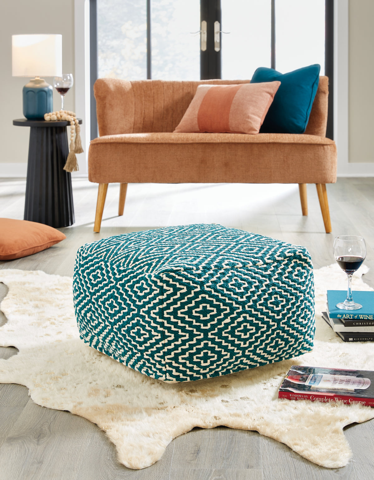 J&M Furniture - Ashley Furniture - Brynnsen Pouf - Pouf / Teal/Ivory - A1001055