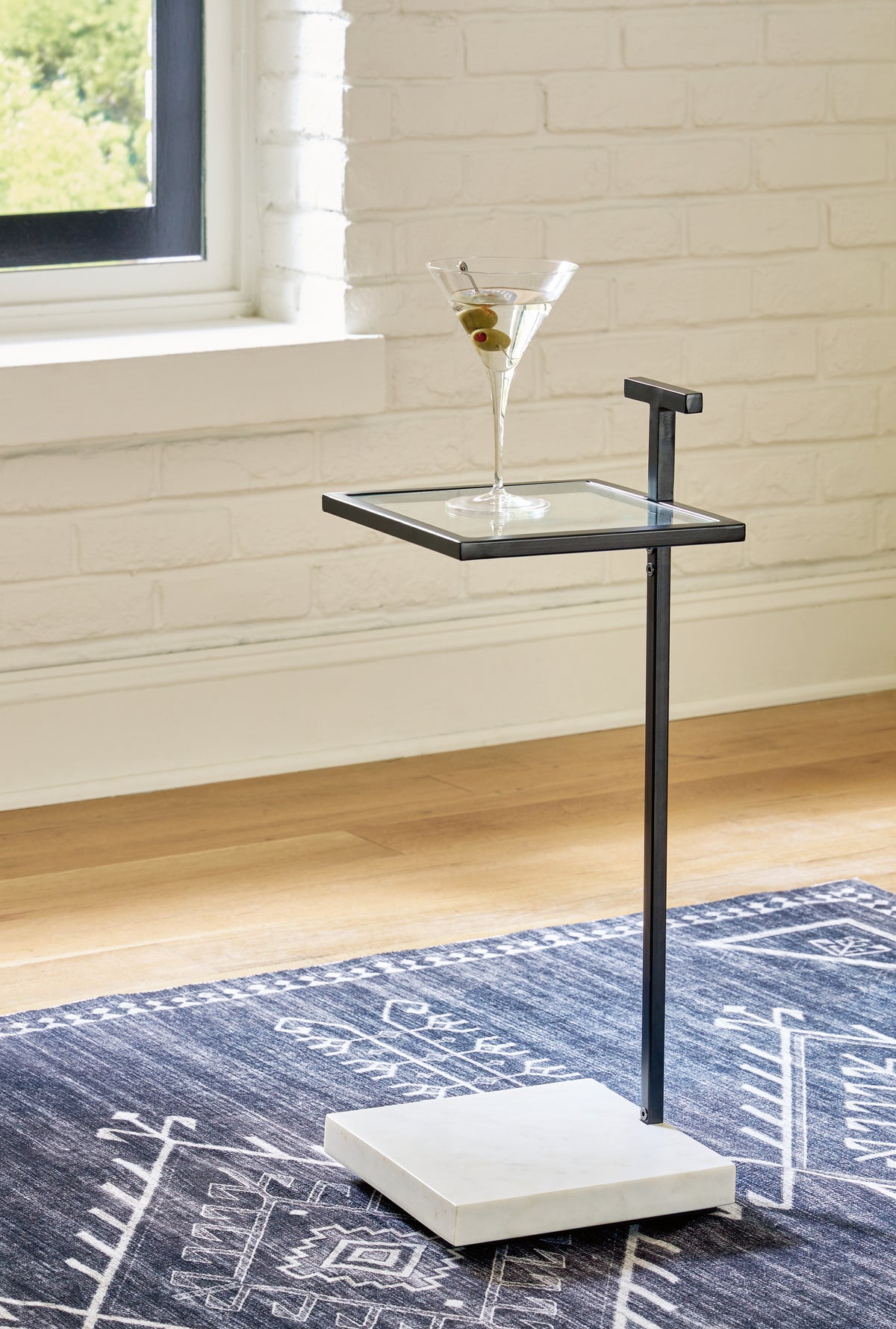 J&M Furniture - Ashley Furniture - Mannill Accent Table - Accent Table / Black/White - A4000630