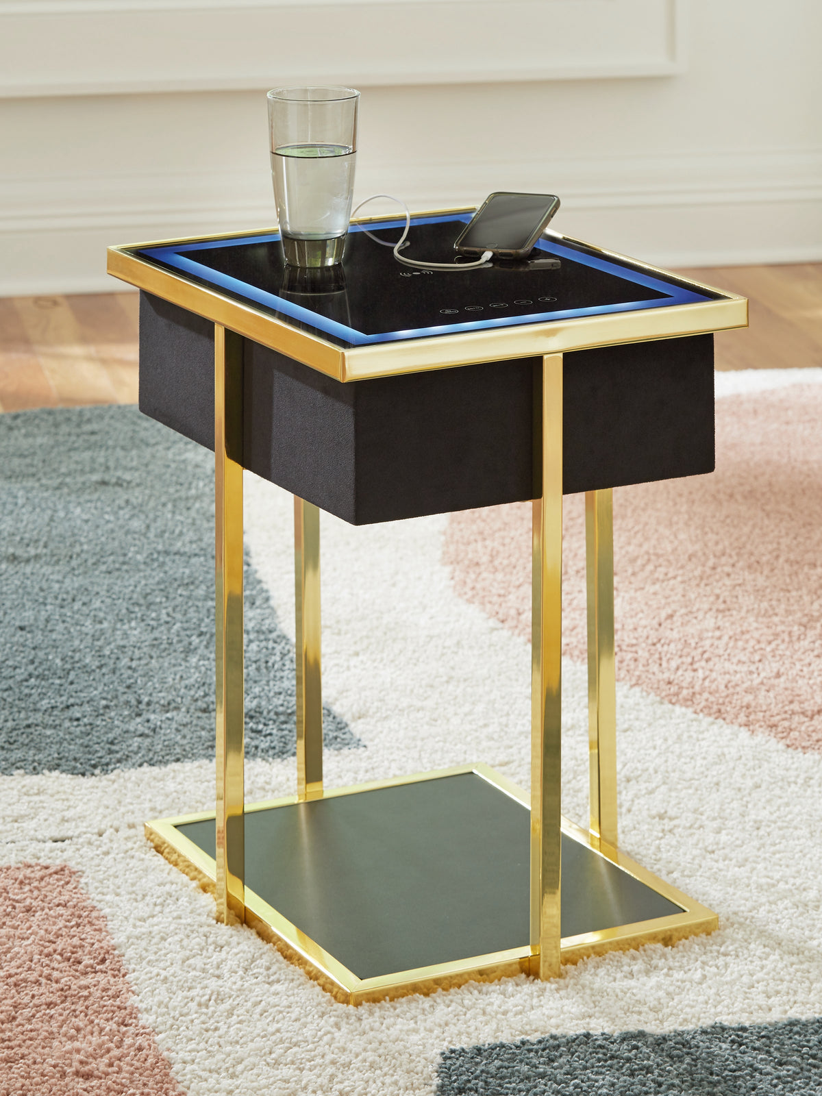 J&M Furniture - Ashley Furniture - Rexwell Accent Table with Speaker - Accent Table with Speaker / Black/Gold Finish - A4000681
