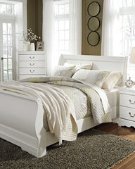 J&M Furniture - Ashley Furniture - Anarasia Queen Sleigh Bed with Chest of Drawers and Nightstand - Queen Sleigh Bed with Chest of Drawers and Nightstand - B129B12