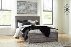J&M Furniture - Ashley Furniture - Bronyan Queen Panel Bed - Queen Panel Bed / Dark Gray - B1290B2