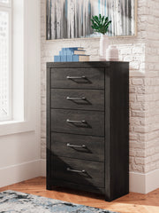 J&M Furniture - Ashley Furniture - Hollivern Chest of Drawers - Five Drawer Chest / Dark Gray - PCB2108-46
