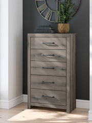 J&M Furniture - Ashley Furniture - Graystorm Chest of Drawers - Five Drawer Chest / Brown Gray - PCB2405-46