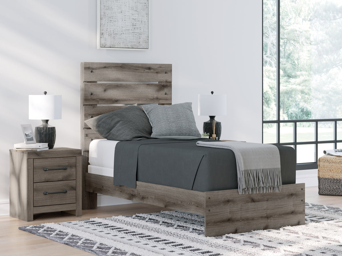 J&M Furniture - Ashley Furniture - Graystorm Twin Panel Bed - Twin Panel Bed / Brown Gray - PCB2405B12