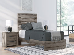 J&M Furniture - Ashley Furniture - Graystorm Twin Panel Bed - Twin Panel Bed / Brown Gray - PCB2405B12