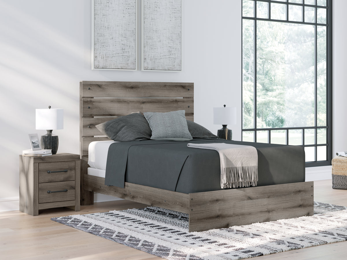 J&M Furniture - Ashley Furniture - Graystorm Queen Panel Bed - Queen Panel Bed / Brown Gray - PCB2405B2