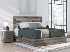 J&M Furniture - Ashley Furniture - Graystorm King Panel Bed - King Panel Bed / Brown Gray - PCB2405B8