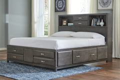J&M Furniture - Ashley Furniture - Caitbrook Queen Storage Bed with 8 Drawers - Queen Storage Bed with 8 Drawers / Gray - B476B2